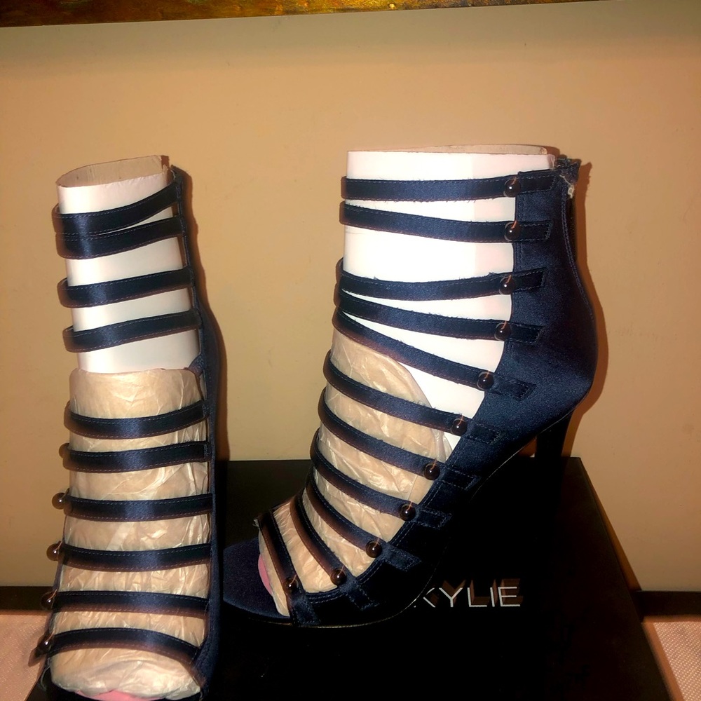 Navy blue; sexy, sassy, very classy shoe; with dark pewter hardware;